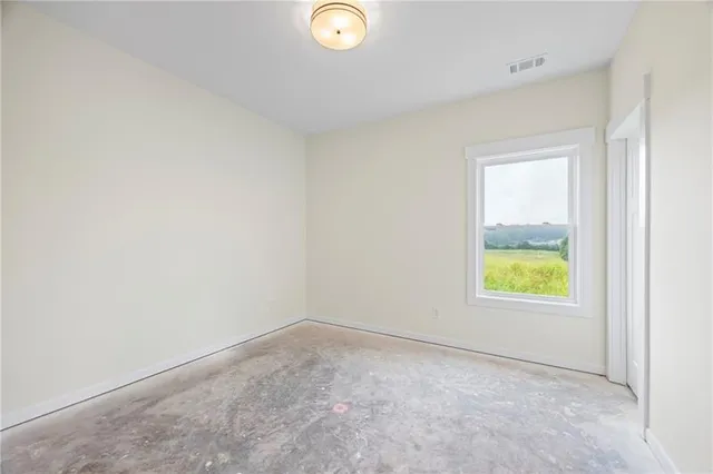 an empty room with window