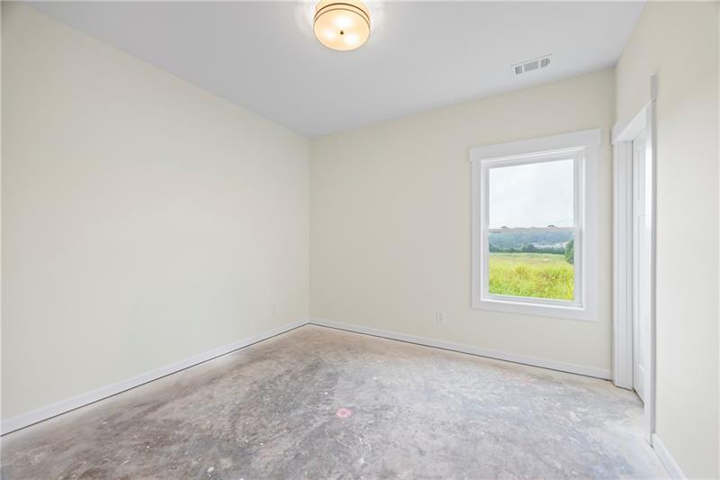 633 Racetrack Road Toccoa, GA 30577 - Photo 34 of 37 an empty room with window