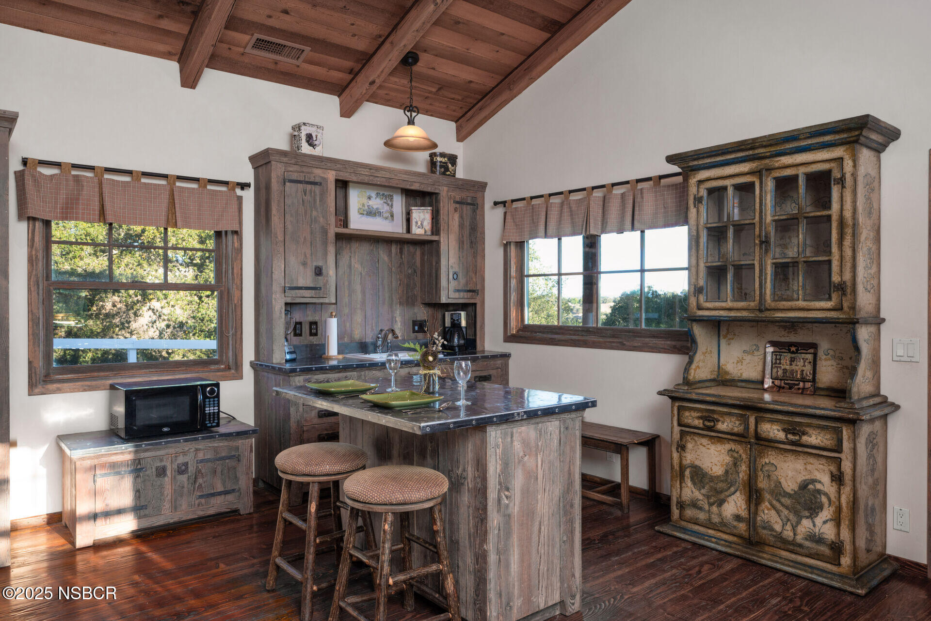 4086 East Oak Trail Road Santa Ynez, CA 93460 - Photo 46 of 57 a view of a dining room with furniture window and wooden floor