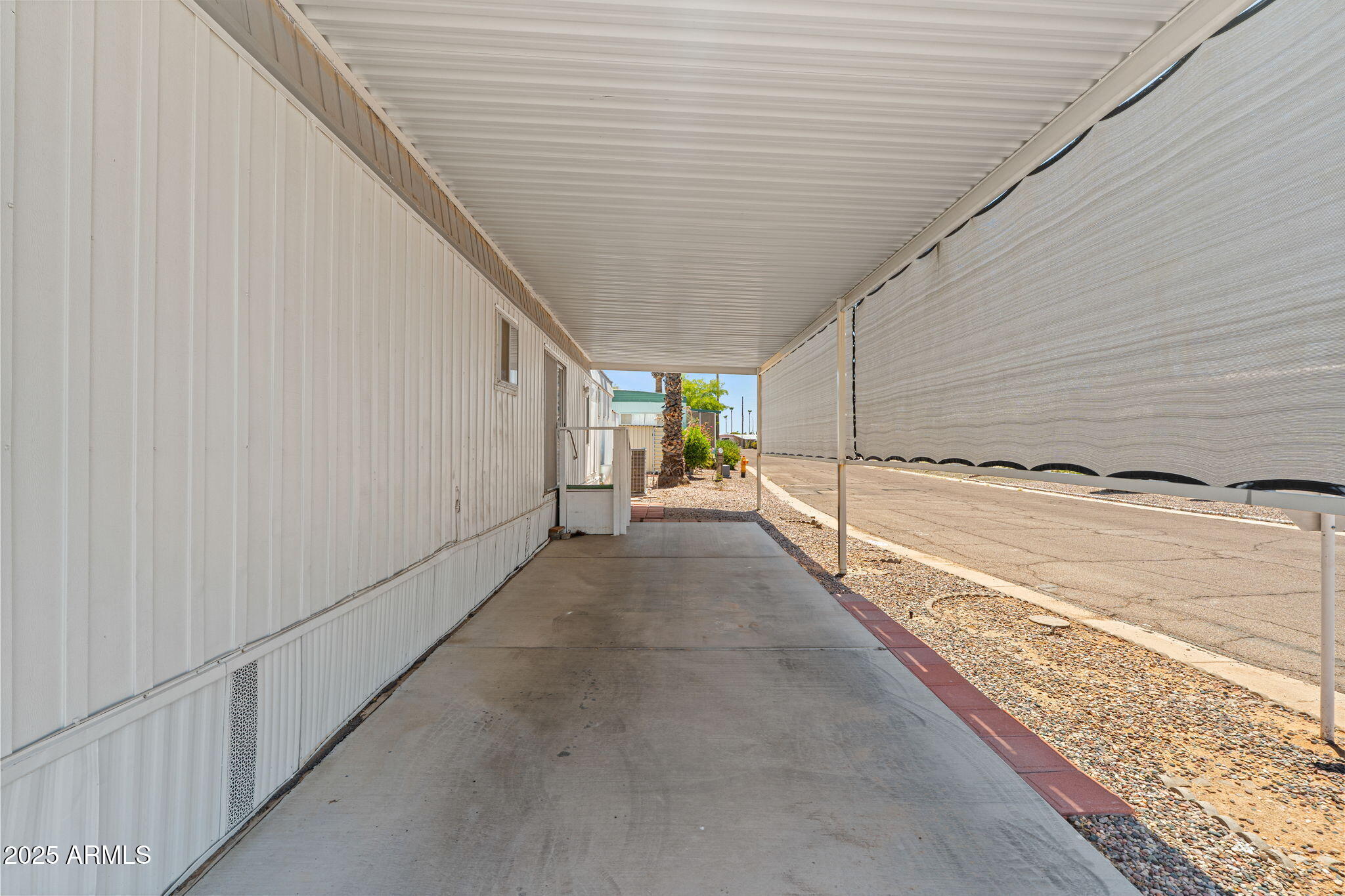 201 South Greenfield Road, Unit 207 Mesa, AZ 85206 - Photo 23 of 50 a view of a porch