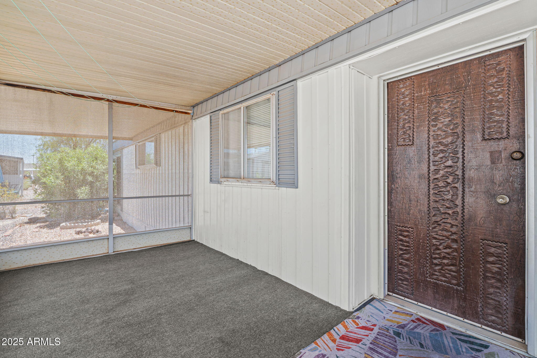 201 South Greenfield Road, Unit 207 Mesa, AZ 85206 - Photo 33 of 50 a view of an empty room with a window