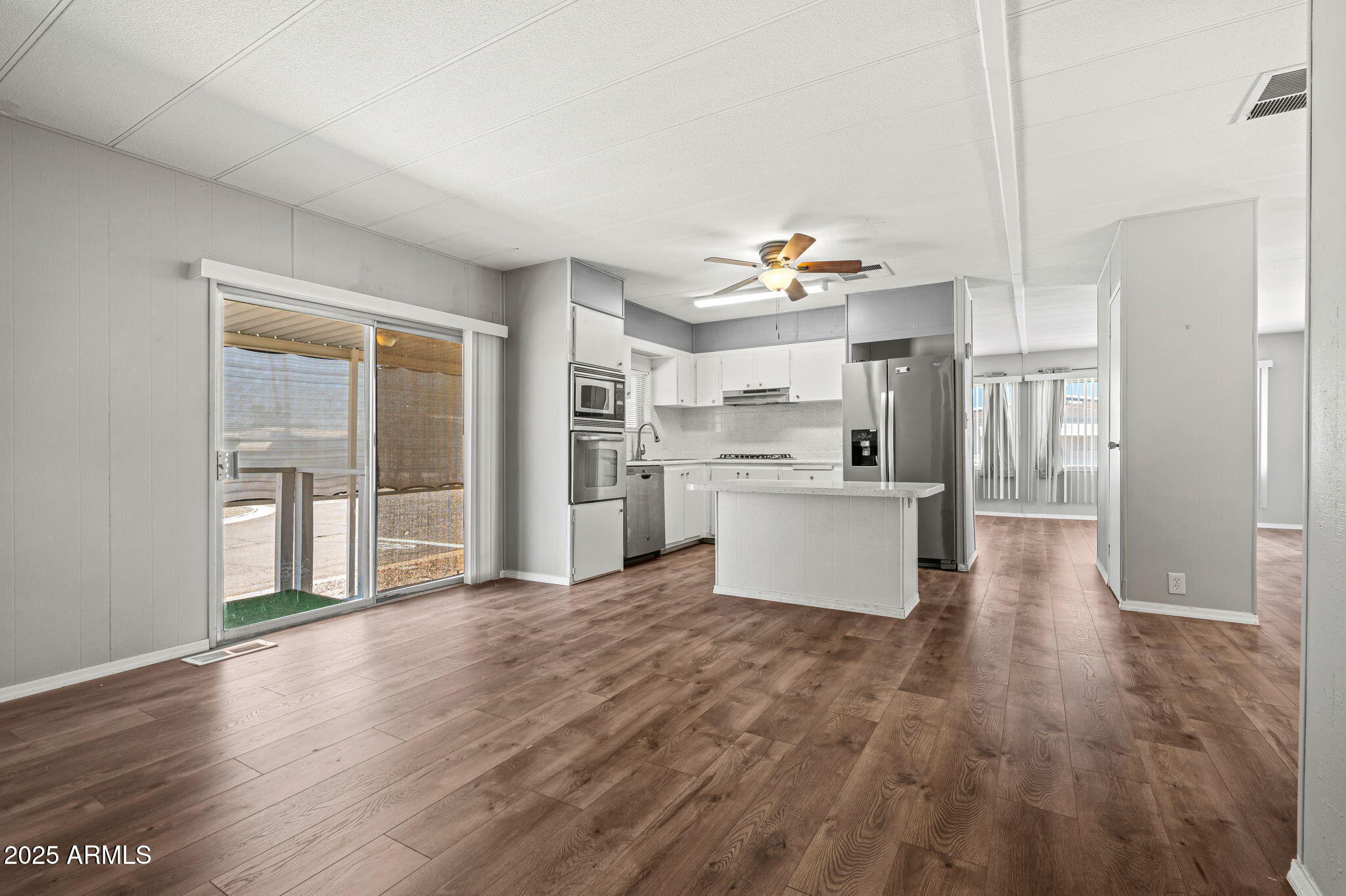 201 South Greenfield Road, Unit 207 Mesa, AZ 85206 - Photo 45 of 50 a view of a kitchen with wooden floor