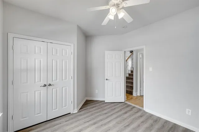 a bathroom with a sink toilet and a mirror