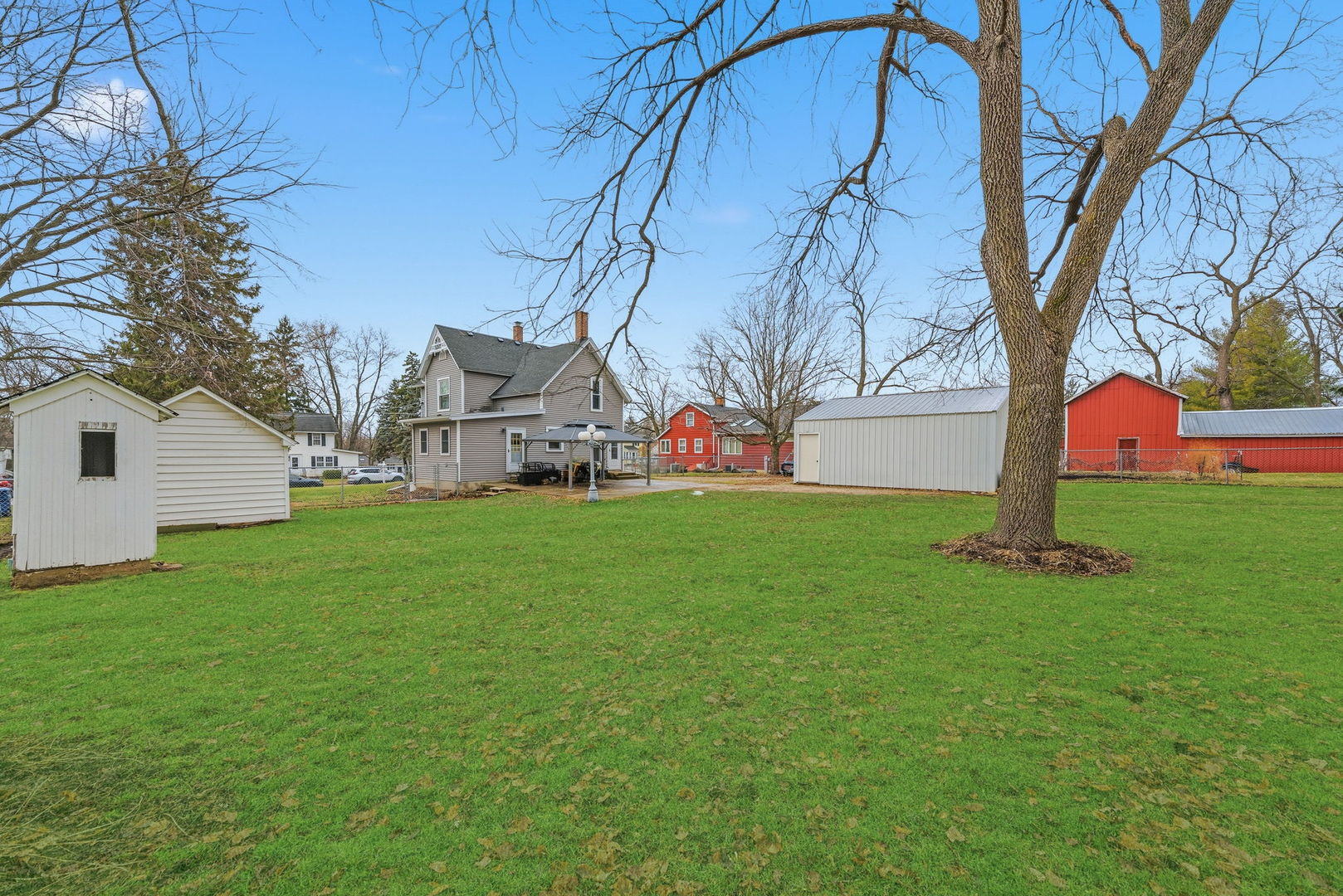 410 West Reader Street Elburn, IL 60119 - Photo 16 of 19 a view of a house with backyard and garden