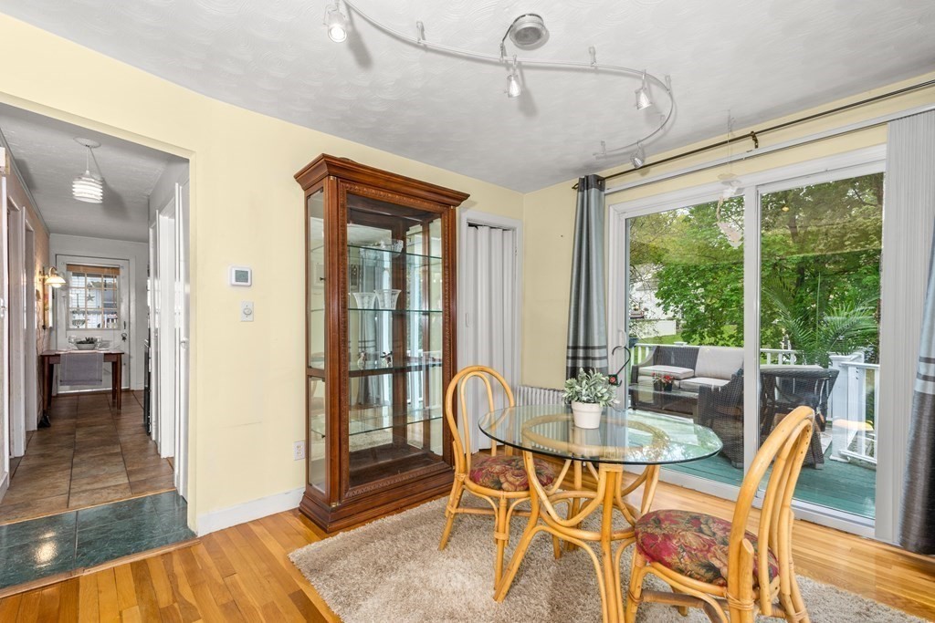 164 Beaconsfield Road Worcester, MA 01602 - Photo 12 of 40 a view of a dining room with furniture window and wooden floor