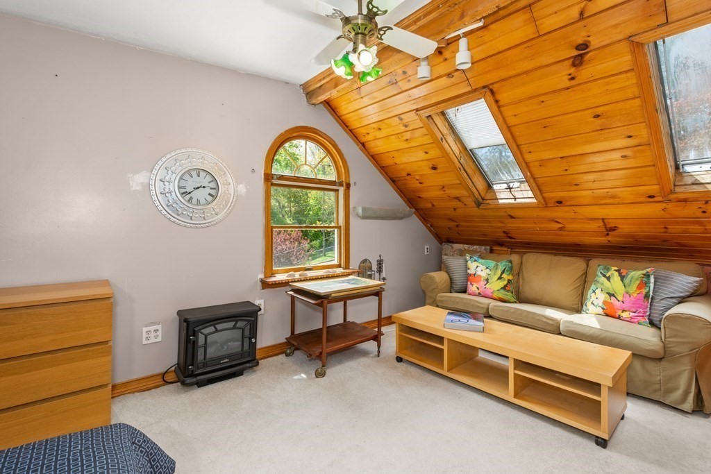 164 Beaconsfield Road Worcester, MA 01602 - Photo 23 of 40 a living room with furniture and a window