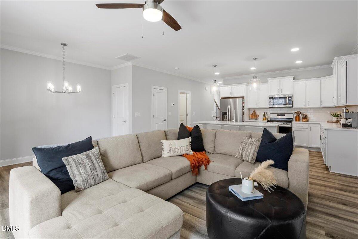 603 Marshskip Way Rolesville, NC 27571 - Photo 13 of 28 a living room with furniture and kitchen view