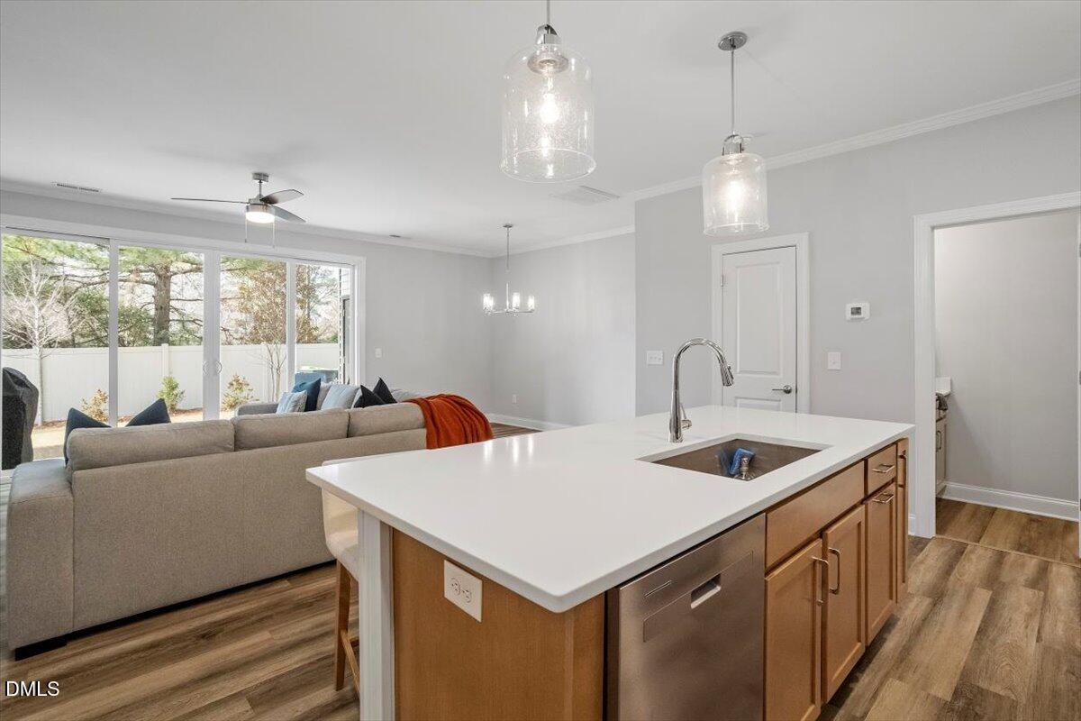 603 Marshskip Way Rolesville, NC 27571 - Photo 9 of 28 a kitchen with a sink and a refrigerator