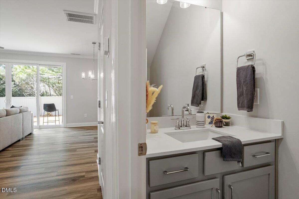 603 Marshskip Way Rolesville, NC 27571 - Photo 10 of 28 a bathroom with a sink and a mirror