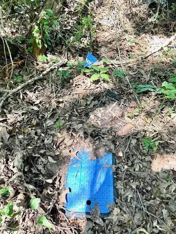 a balcony with table and chairs