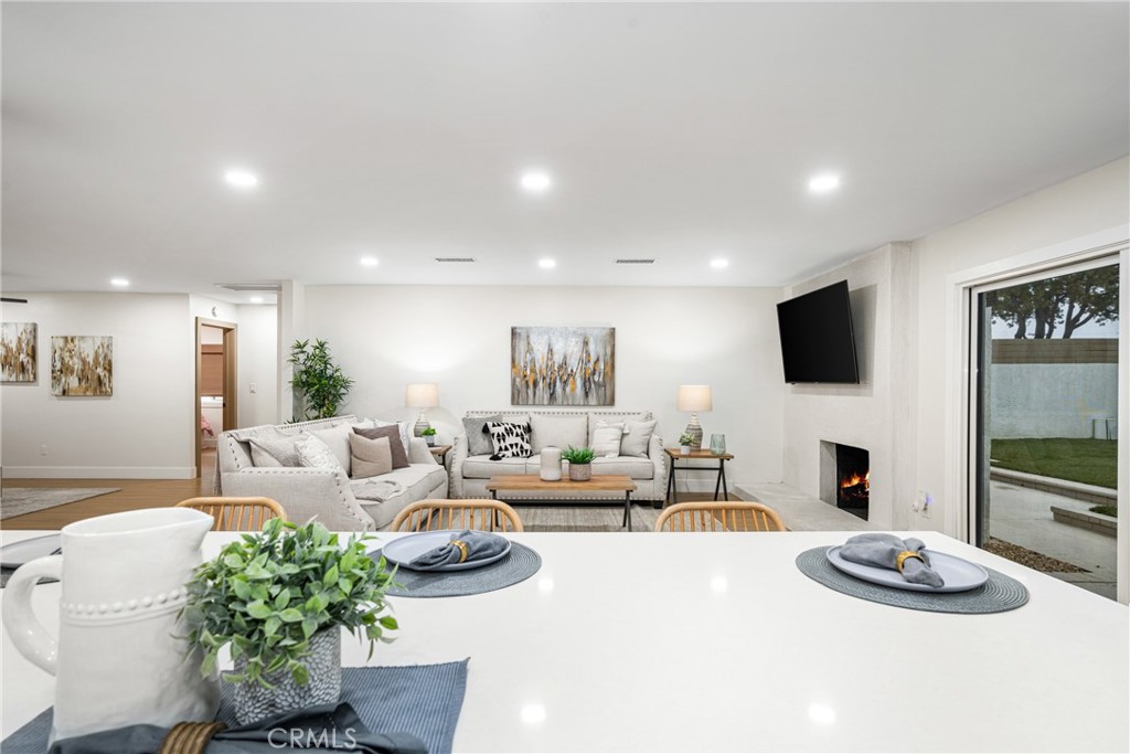 3660 Pioneer Boulevard Long Beach, CA 90808 - Photo 21 of 50 a living room with furniture and a flat screen tv