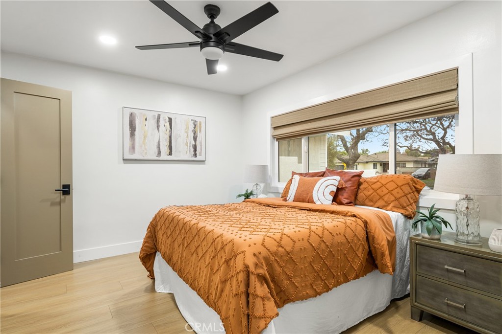 3660 Pioneer Boulevard Long Beach, CA 90808 - Photo 26 of 50 a bed sitting in a bedroom next to a window