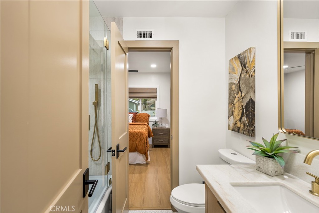 3660 Pioneer Boulevard Long Beach, CA 90808 - Photo 30 of 50 a bathroom with a sink a toilet and shower