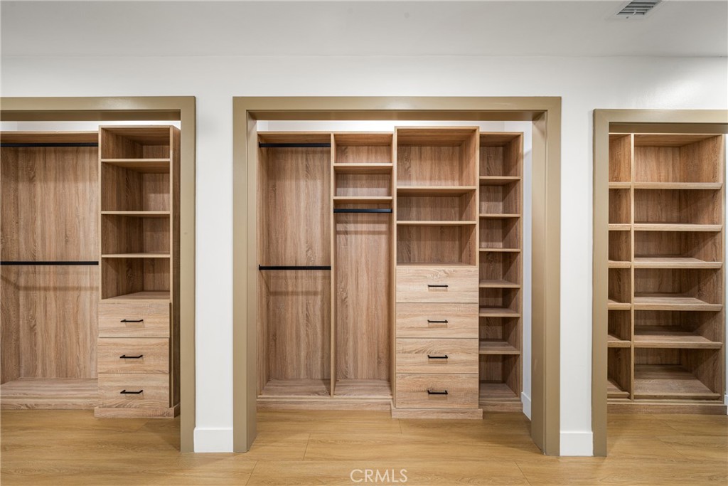 3660 Pioneer Boulevard Long Beach, CA 90808 - Photo 39 of 50 a view of walk in closet with empty racks