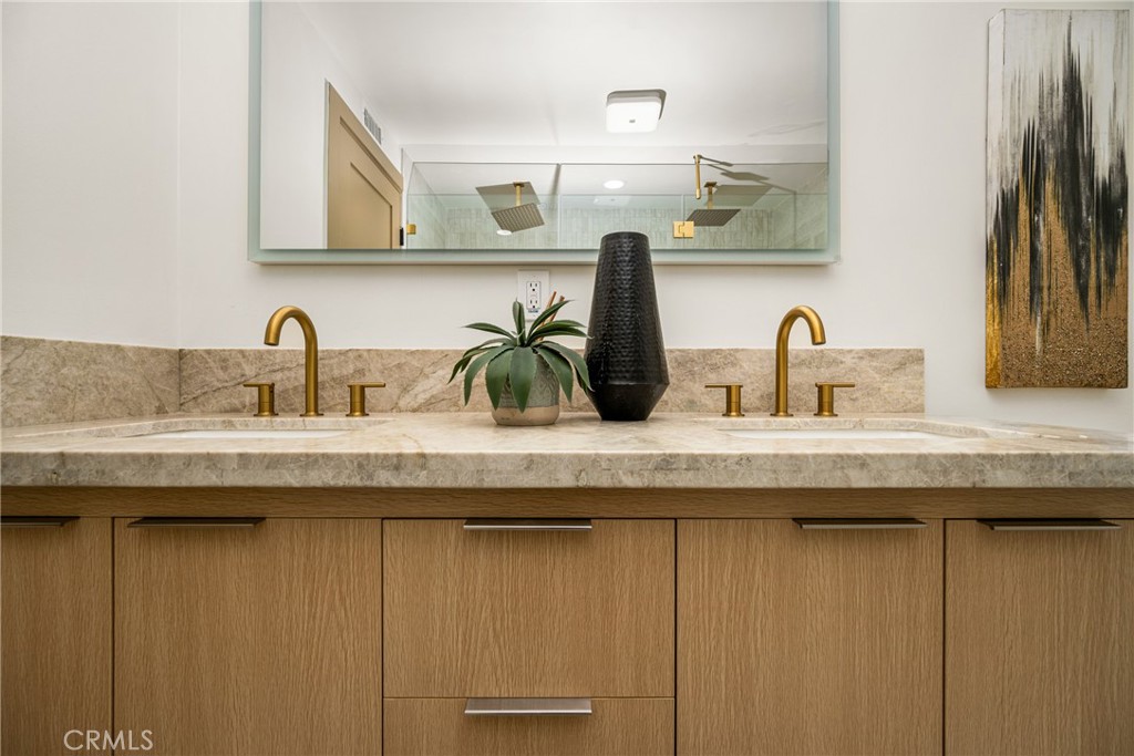 3660 Pioneer Boulevard Long Beach, CA 90808 - Photo 44 of 50 a bathroom with a sink and a mirror