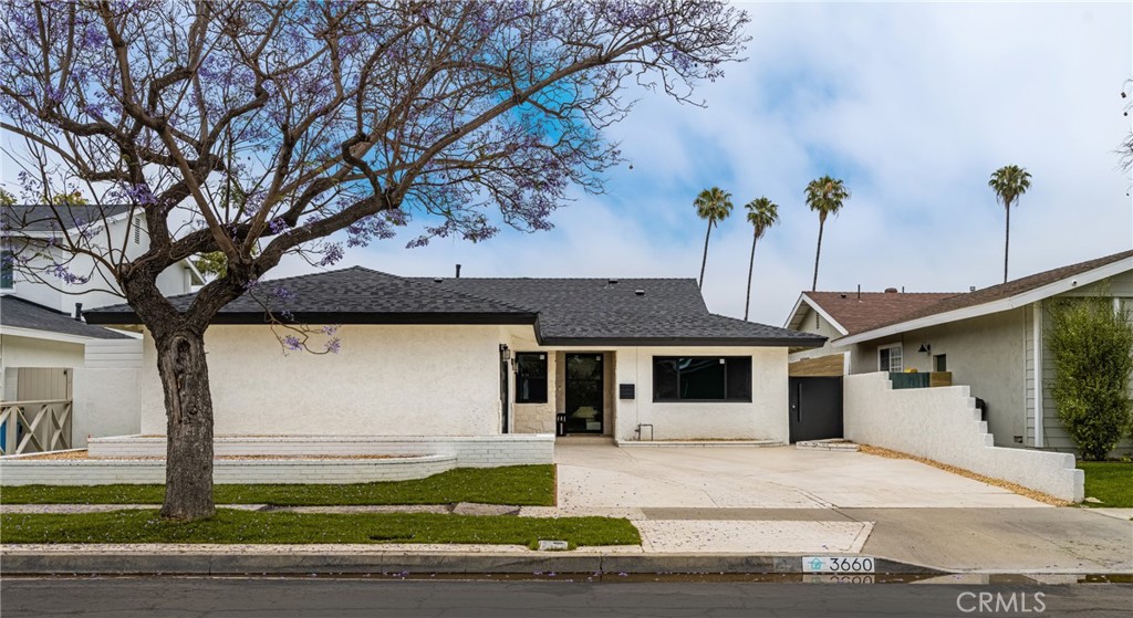 3660 Pioneer Boulevard Long Beach, CA 90808 - Photo 6 of 50 a front view of a house with garden