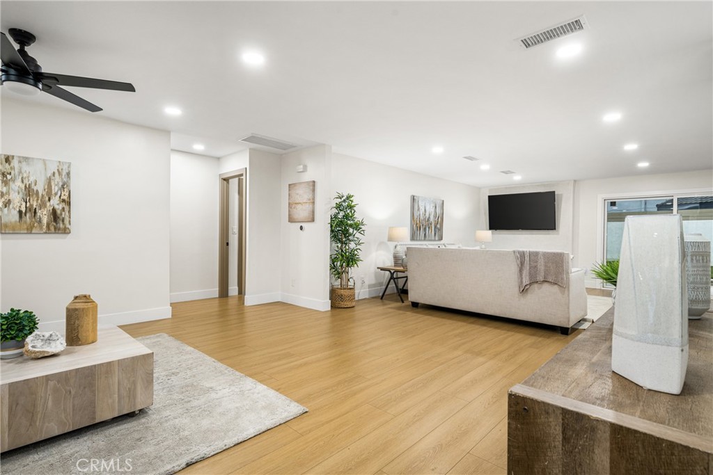 3660 Pioneer Boulevard Long Beach, CA 90808 - Photo 8 of 50 a living room with furniture and a flat screen tv