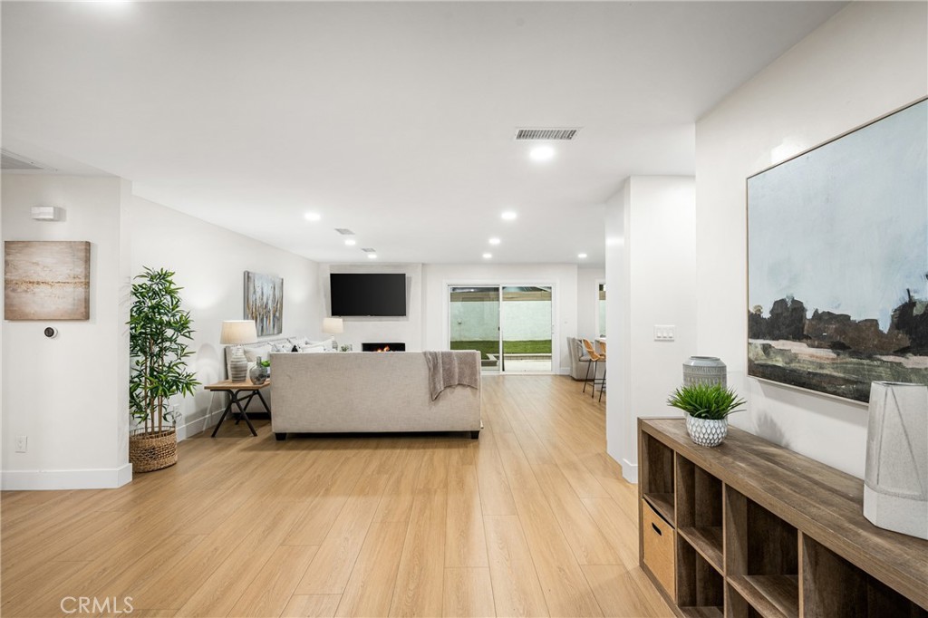 3660 Pioneer Boulevard Long Beach, CA 90808 - Photo 9 of 50 a living room with furniture and a flat screen tv