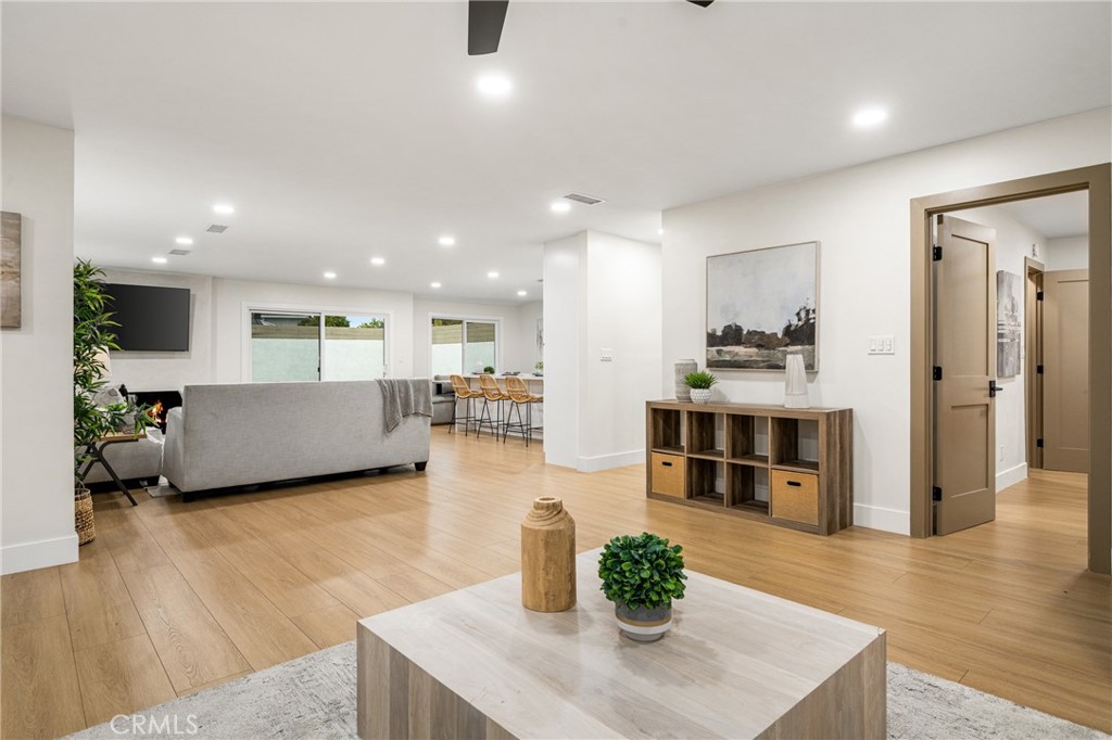 3660 Pioneer Boulevard Long Beach, CA 90808 - Photo 10 of 50 a living room with furniture wooden floor and a kitchen view