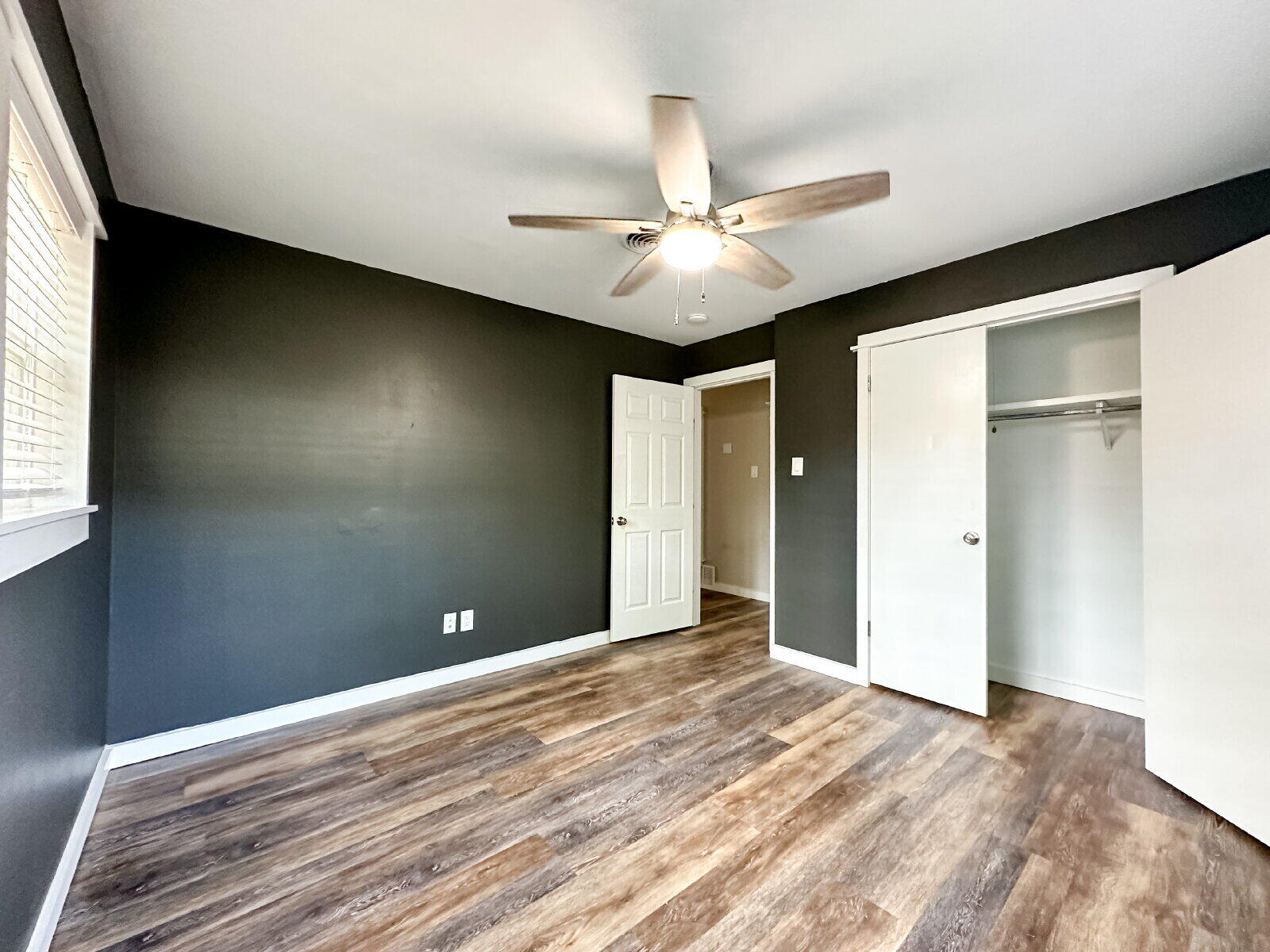 2608 Raleigh Avenue Lubbock, TX 79410 - Photo 6 of 23 a view of a livingroom with a ceiling fan and window