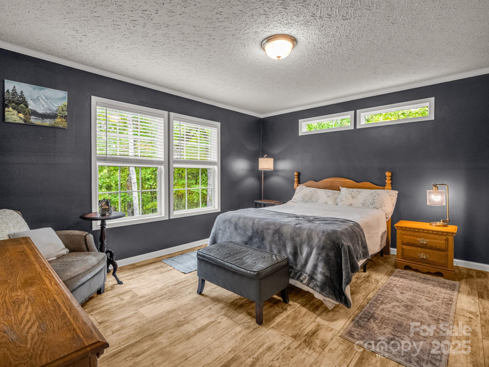 343 East Marshall Ridge Road Hendersonville, NC 28792 - Photo 13 of 44 a bedroom with a bed and window