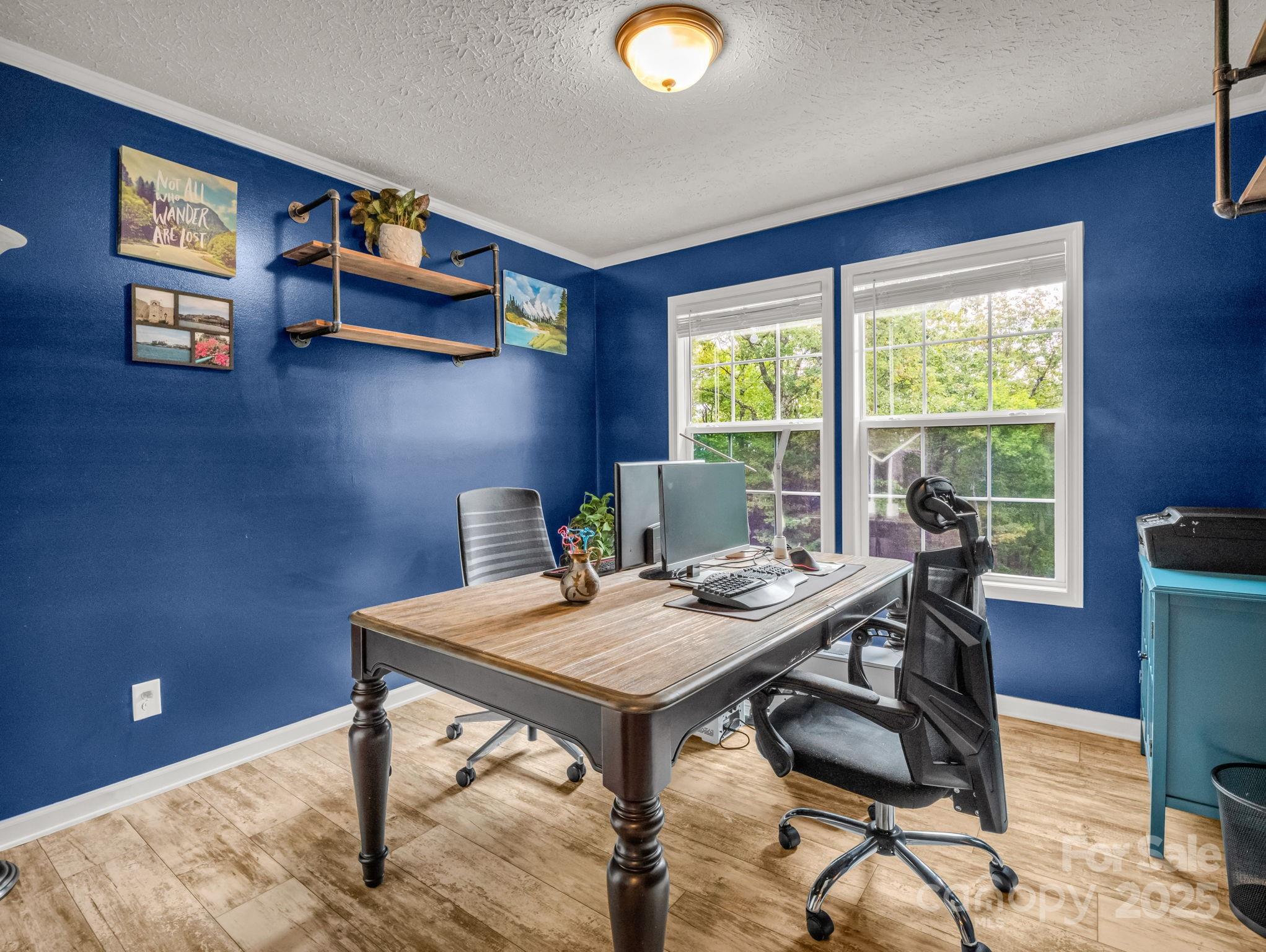 343 East Marshall Ridge Road Hendersonville, NC 28792 - Photo 20 of 44 a view of a workspace with furniture and a window