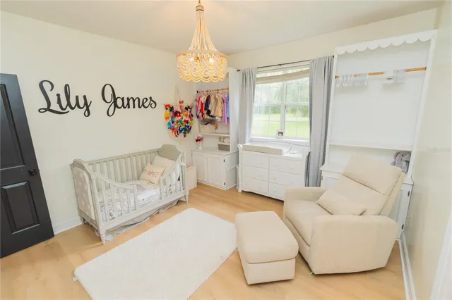 a bathroom with a bathtub sink and a mirror