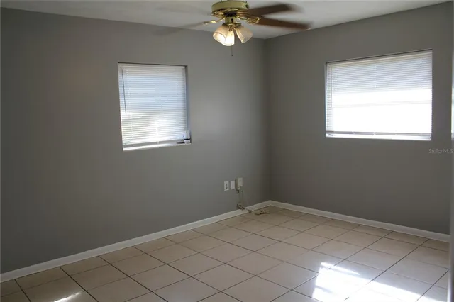 a view of a room that has a window