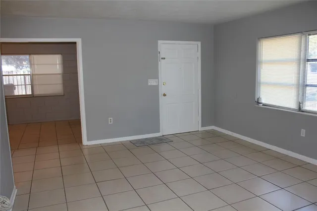 an empty room with windows