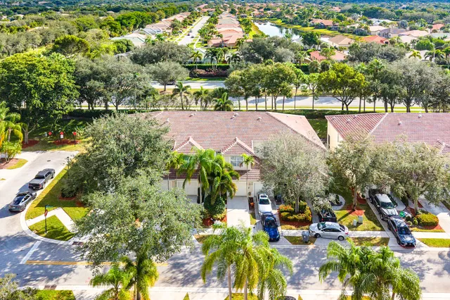 a view of a pathway besides a house
