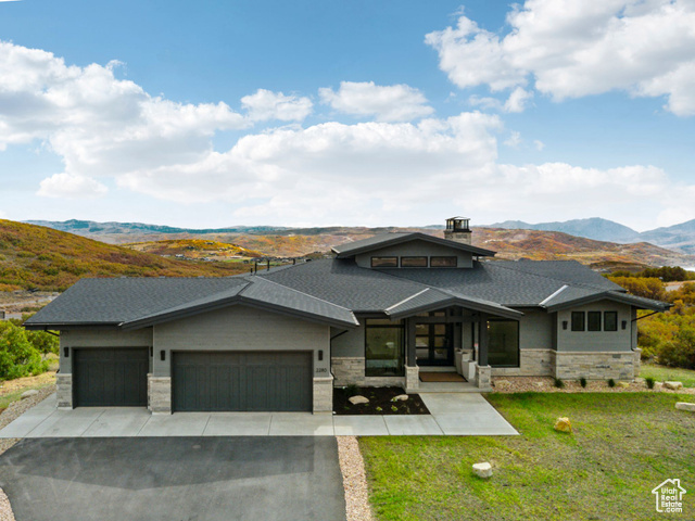 2280 East Outlaw Road, Unit 56 Kamas, UT 84036 - Photo 4 of 59 Prairie-style home with a mountain view, an attached garage, driveway, and a front lawn