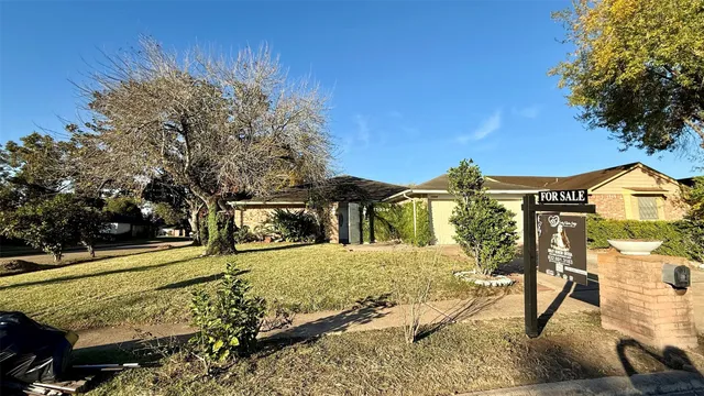 a view of a swimming pool with an outdoor seating