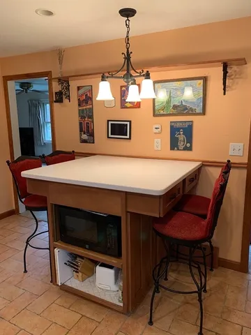 a bedroom with a bed and a mirror