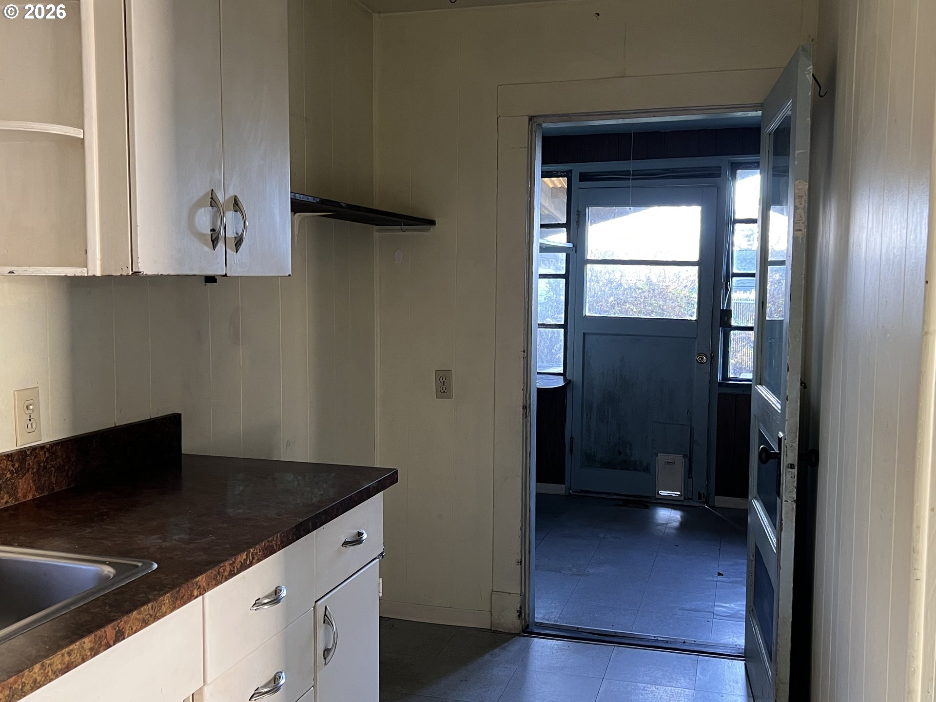 2260 Meade Avenue North Bend, OR 97459 - Photo 15 of 37 a kitchen with a sink and a stove