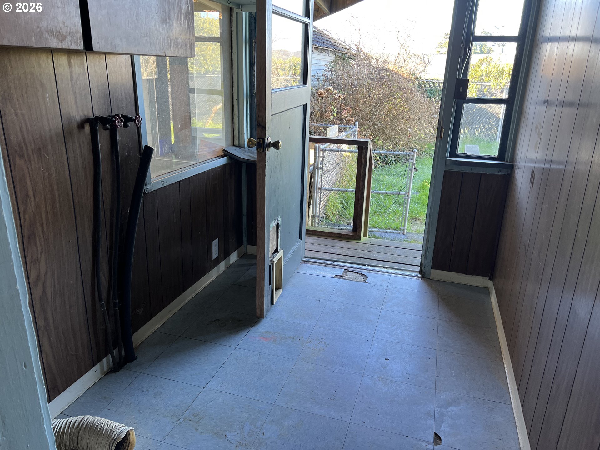 2260 Meade Avenue North Bend, OR 97459 - Photo 16 of 37 wooden floor in an empty room with a window