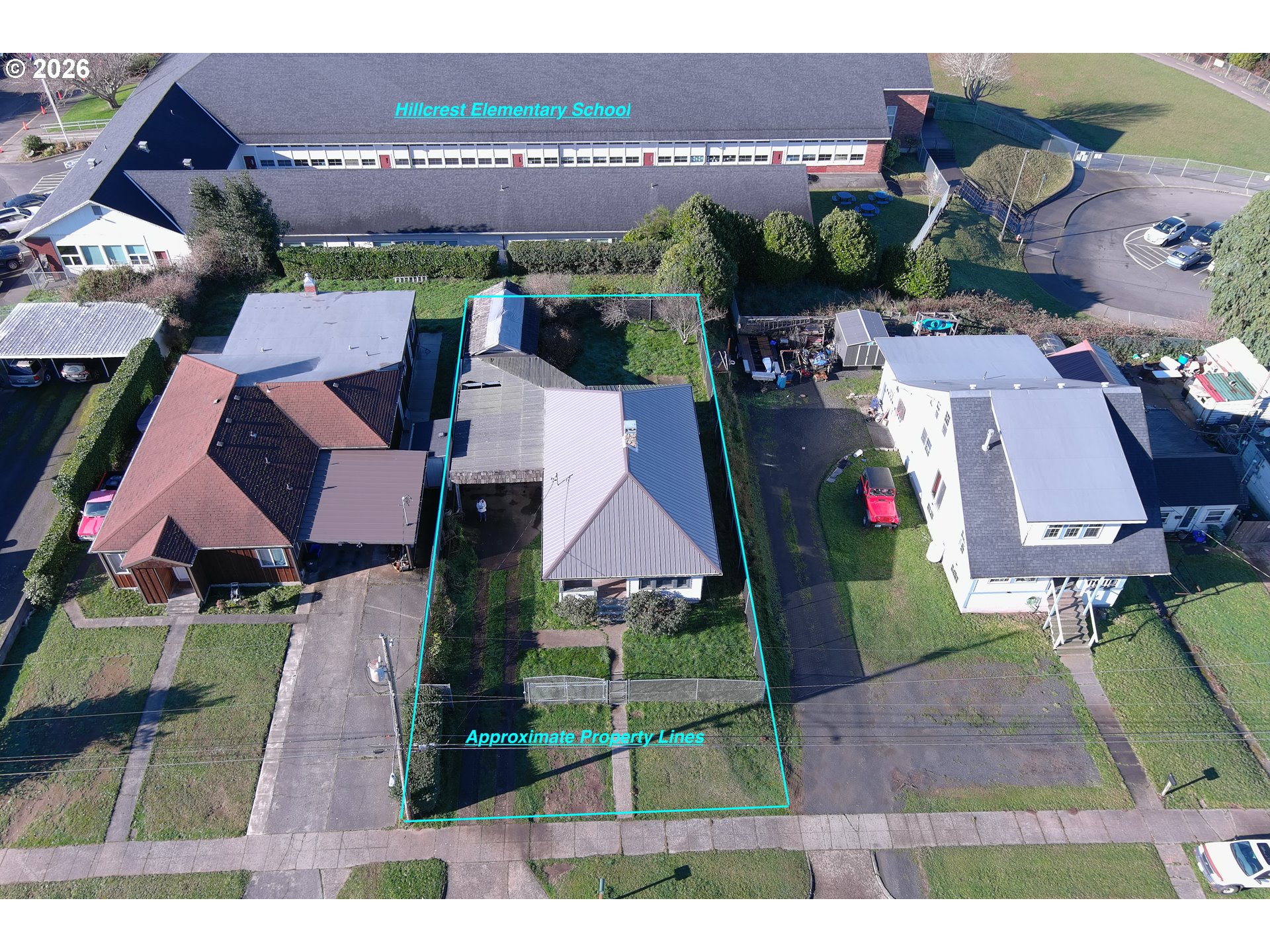 2260 Meade Avenue North Bend, OR 97459 - Photo 2 of 37 an aerial view of multiple houses with yard