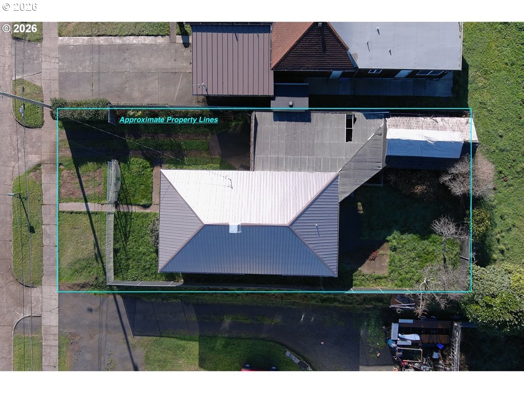 2260 Meade Avenue North Bend, OR 97459 - Photo 34 of 37 a view of house with yard and sitting space