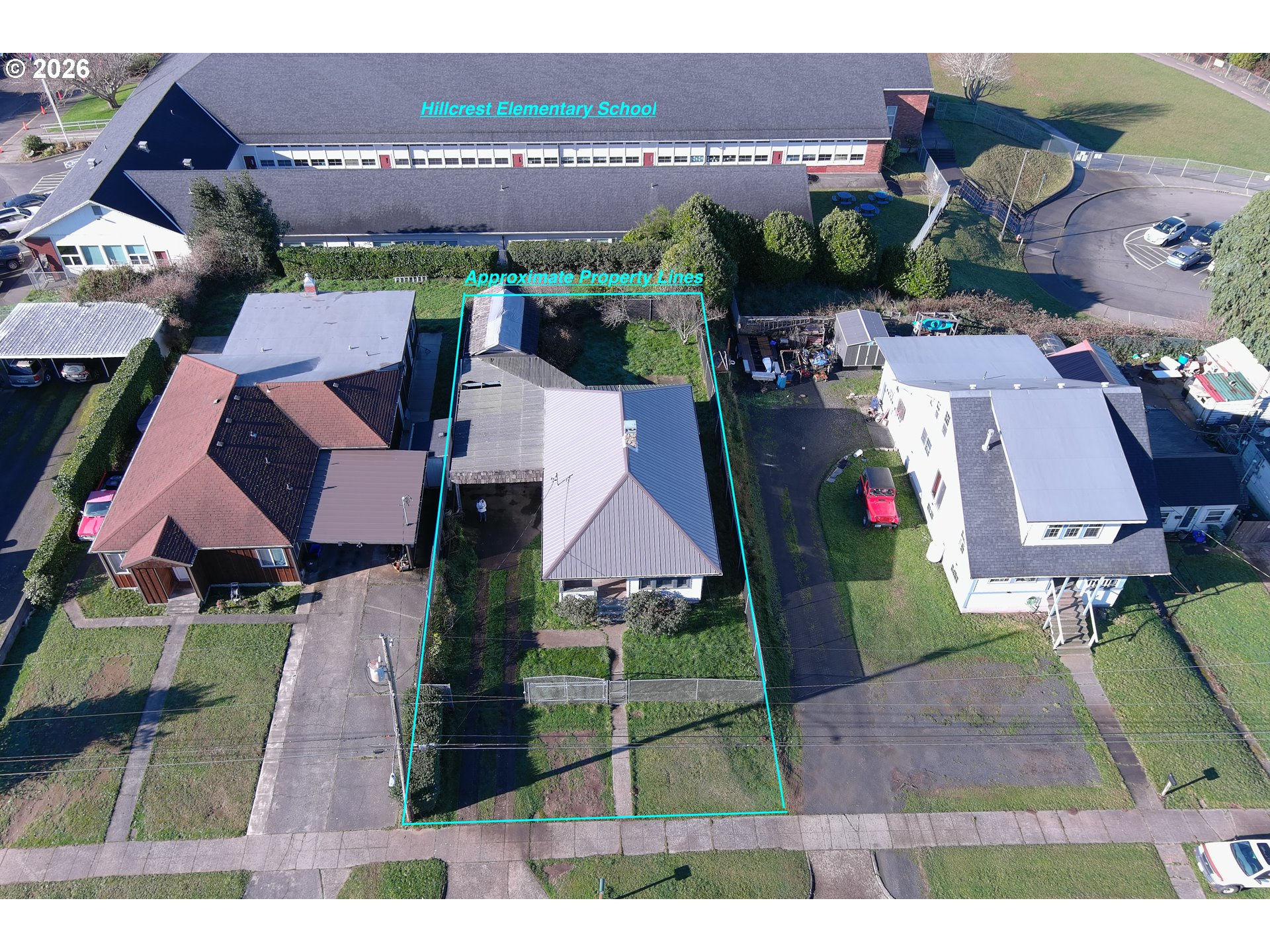 2260 Meade Avenue North Bend, OR 97459 - Photo 35 of 37 an aerial view of multiple houses with yard