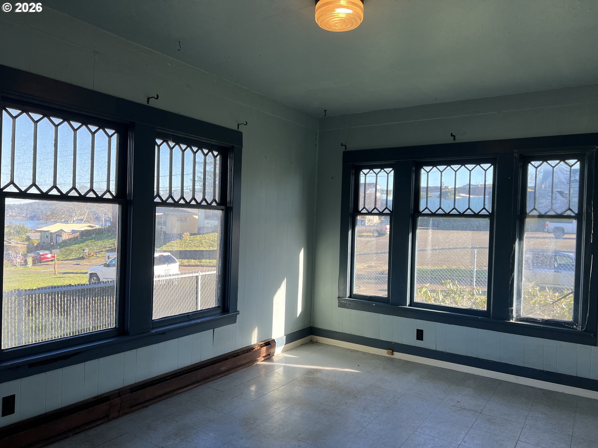 2260 Meade Avenue North Bend, OR 97459 - Photo 8 of 37 an empty room with windows