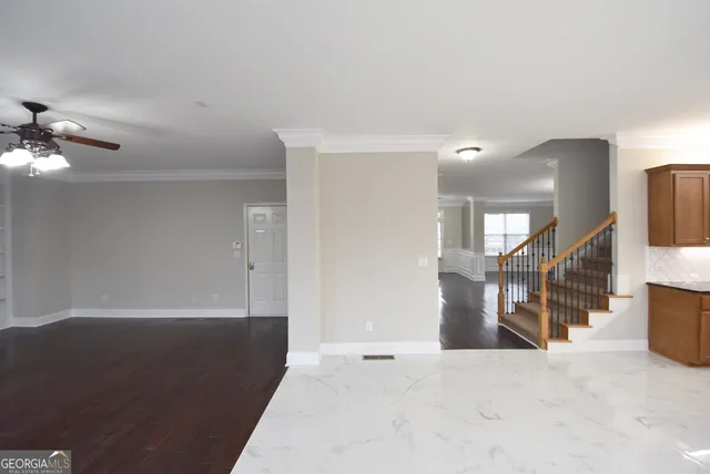 a bathroom with a sink toilet and mirror