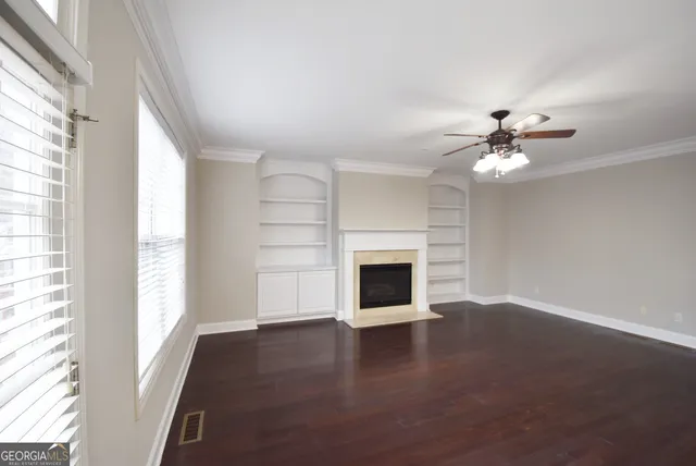 a view of a livingroom with wooden floor