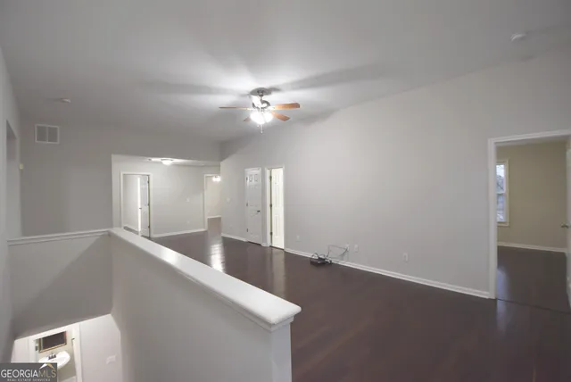 a bathroom with a sink toilet a mirror and shower