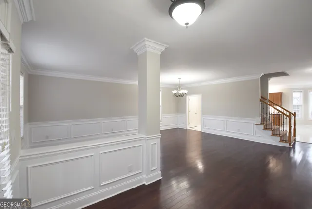 a view of a livingroom with wooden floor
