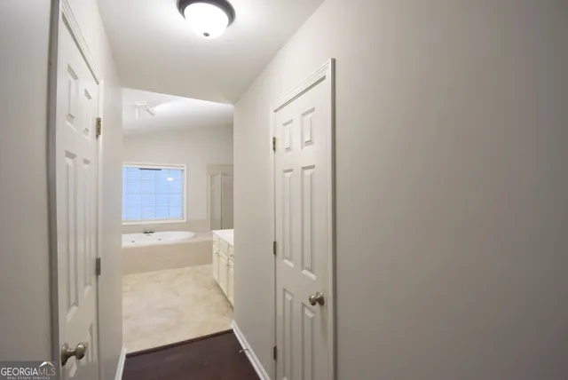 a view of a swimming pool with an outdoor space and seating area