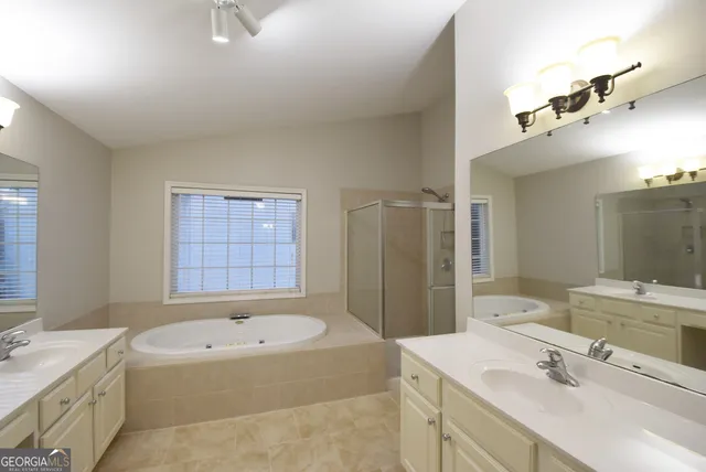 a view of a backyard with sitting area and garden