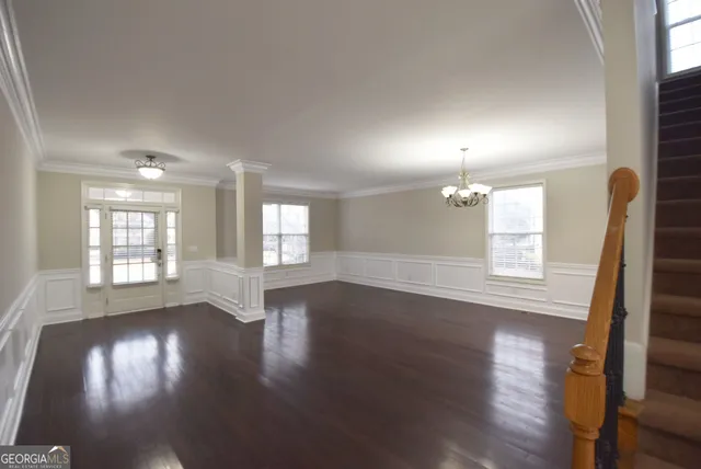 a kitchen with stainless steel appliances kitchen island granite countertop a sink counter space and cabinets