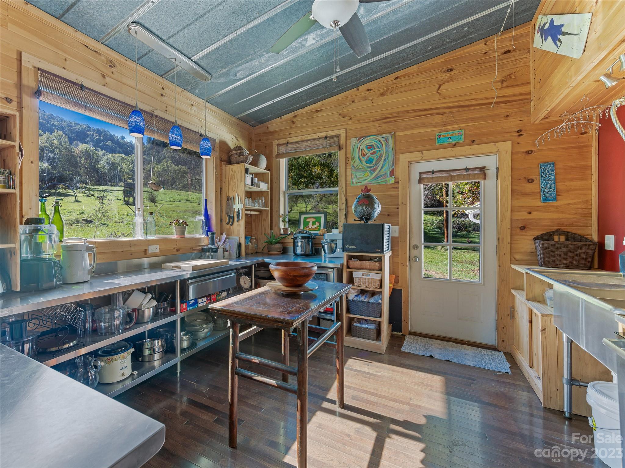 305 Pound Mill Road Marshall, NC 28753 - Photo 18 of 48 a outdoor space with chairs