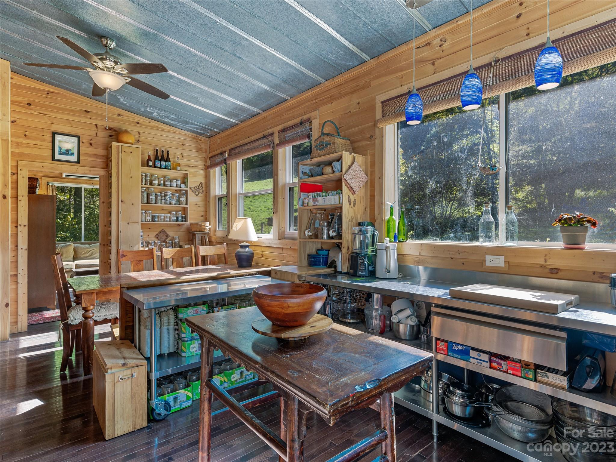 305 Pound Mill Road Marshall, NC 28753 - Photo 19 of 48 a outdoor dining space with chairs