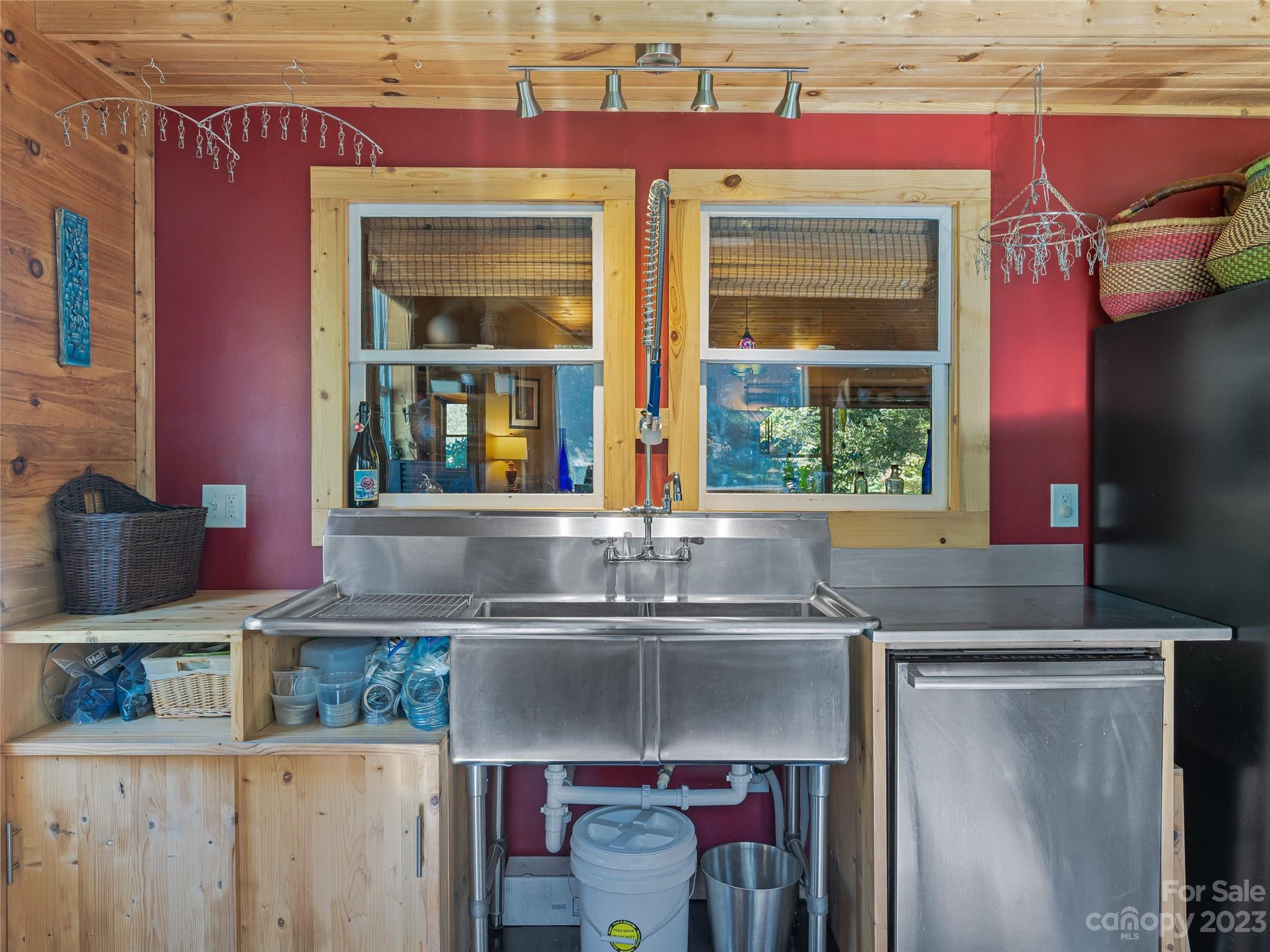305 Pound Mill Road Marshall, NC 28753 - Photo 20 of 48 a kitchen with stainless steel appliances granite countertop a sink and a microwave