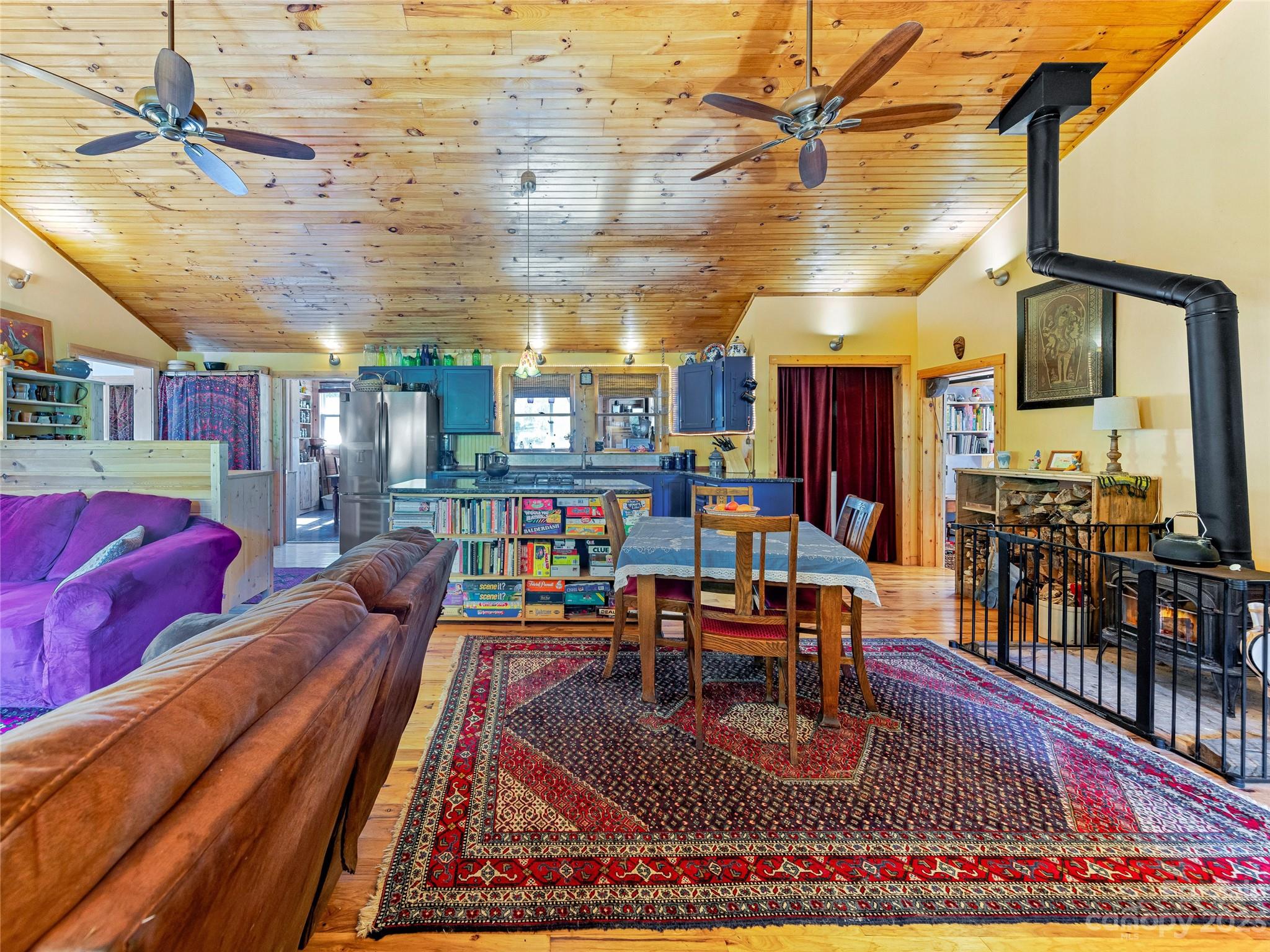 305 Pound Mill Road Marshall, NC 28753 - Photo 9 of 48 a living room with lots of furniture and a table